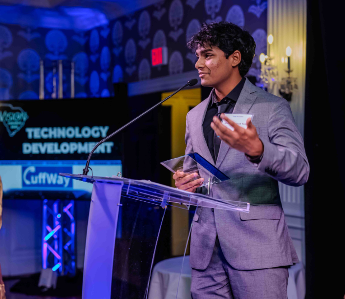 CuffWay founder Shrihan Ganesh Babu accepting a technology development award